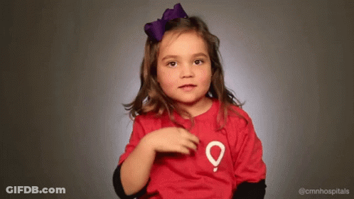Little Girl With Purple Bow In Red Shirt With Map GIF