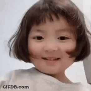Little Girl With Short Hair Smiling Making Face GIF