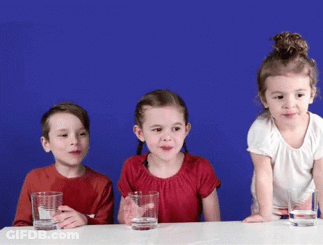 Little Girls Spit Water On Table GIF