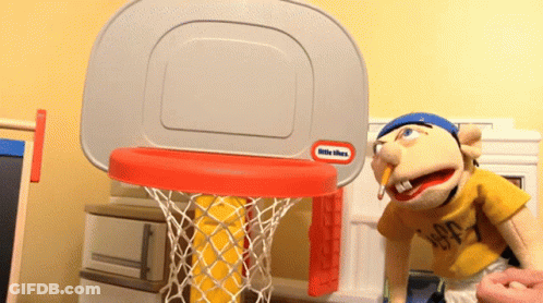 Little Tikes Basketball Hoop Next To Puppet GIF