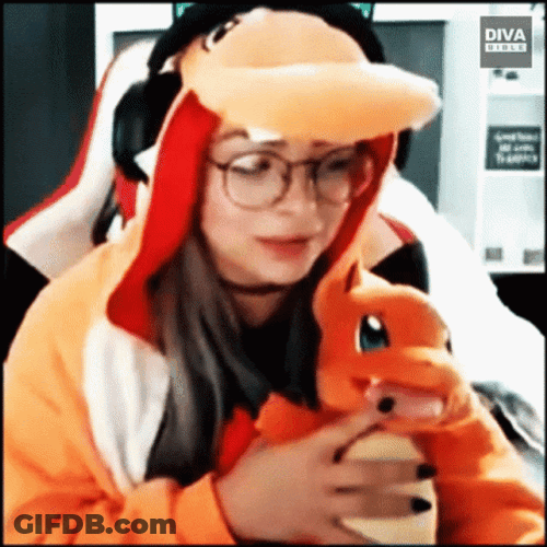 Liv Morgan With Charmander Stuffed Toy GIF