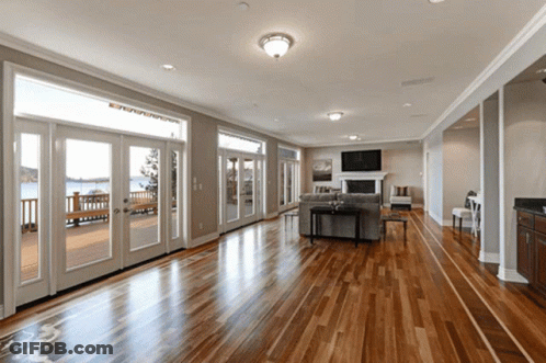 Living Room Hardwood Floors Sliding Glass Doors Deck GIF