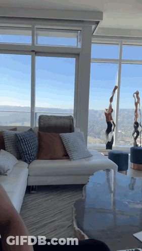 Living Room With Couch And Mountain View GIF