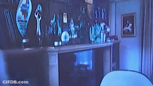 Living Room With Fireplace And TV GIF
