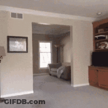 Living Room With Wall Picture And Floor Lamp GIF