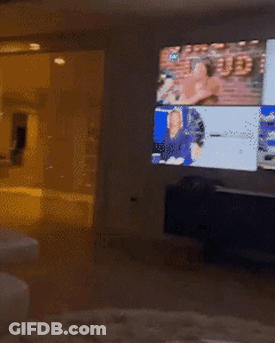 Living Room With White Couch And Striped Pillows GIF