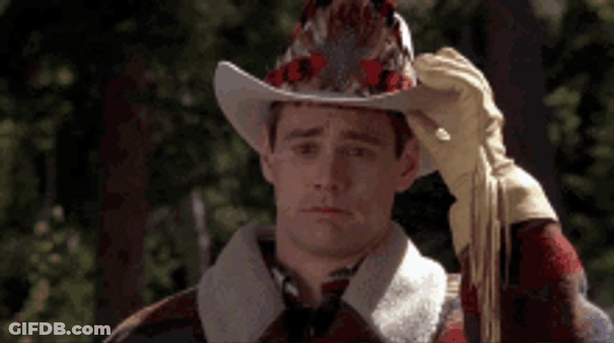 Lloyd Christmas Crying Sad Takes Off Hat GIF