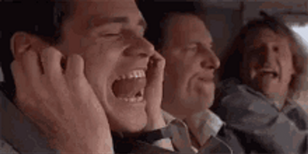 Lloyd Christmas Jim Carrey Not Listening Covering Ears GIF