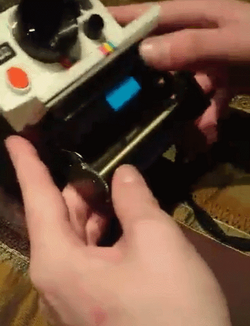 Loading Polaroid Camera GIF
