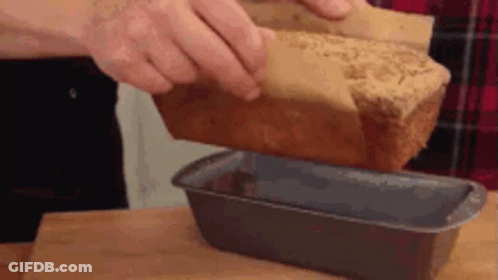 Loaf Of Bread Being Taken Out Of Loaf Pan GIF