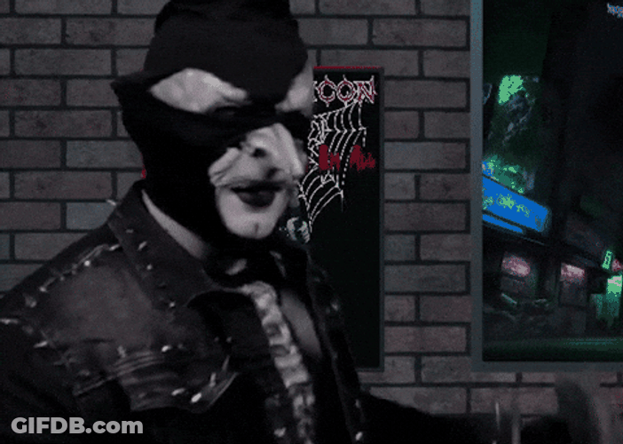 Lock And Load Man Wearing A Costume GIF