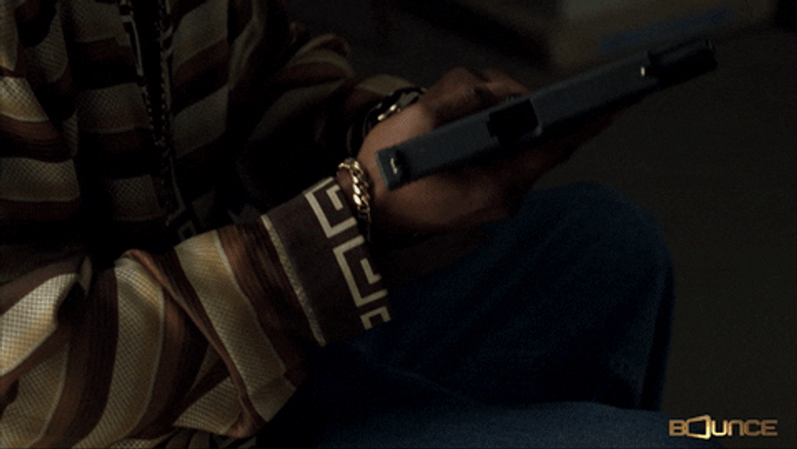 Lock And Load Man Wearing Striped Shirt GIF