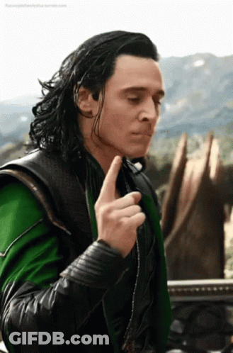 Loki From Avengers : Age Of Ultron Is Making A Funny Face While Holding His Finger To His Chin . GIF