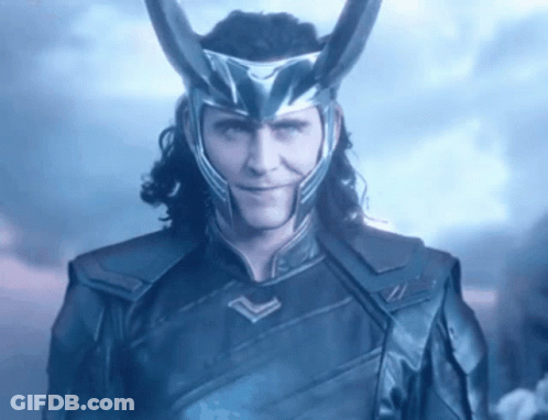 Loki From Avengers : Age Of Ultron Is Wearing A Helmet With Horns And Smiling . GIF