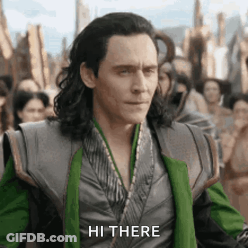 Loki From The Movie Avengers : Age Of Ultron Is Standing In Front Of A Crowd And Saying Hi There . GIF