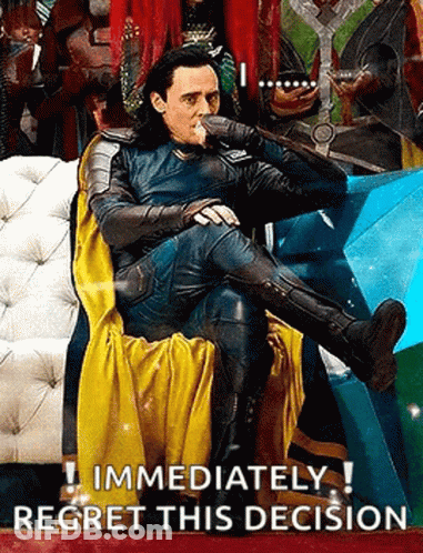 Loki Is Sitting On A Throne With A Sword In His Mouth . GIF