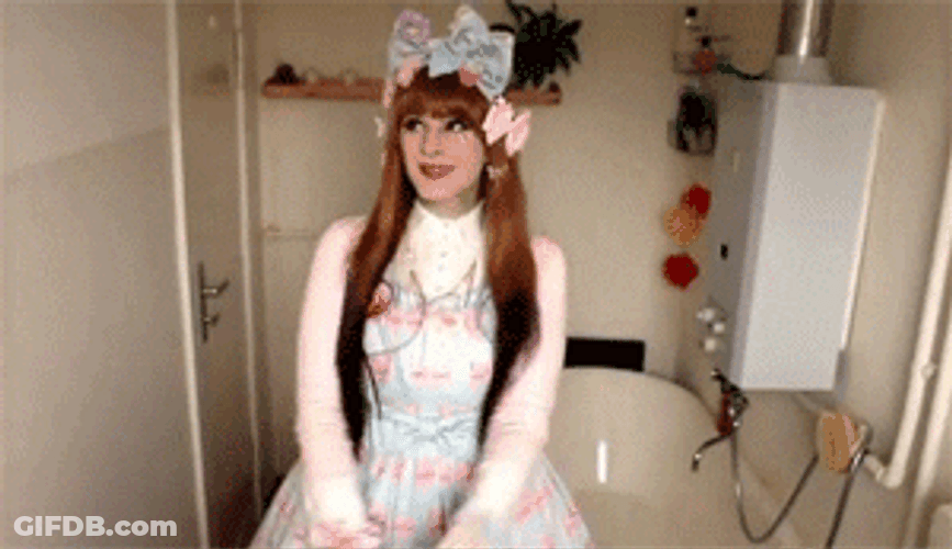Lolita Cosplayer Waving Hello GIF