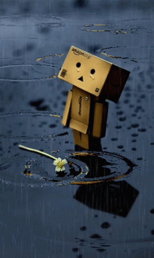 Lonely Cartoon Figure Flower Raining GIF