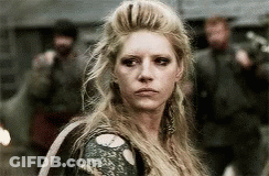 Long Blonde Hair Woman Standing Before Crowd GIF