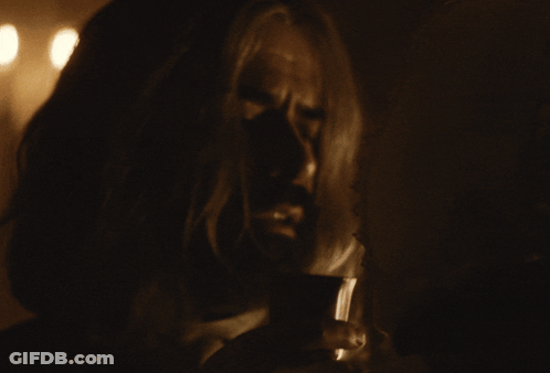 Long Hair Beard Man Looking Down In Dark GIF