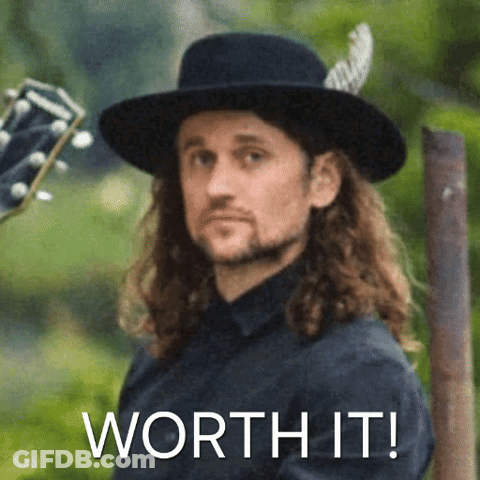 Long Hair Man In Black Hat Holding Guitar Saying Worth It GIF