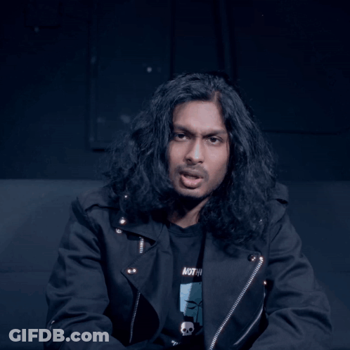 Long Hair Man In Black Jacket And Skull Shirt GIF