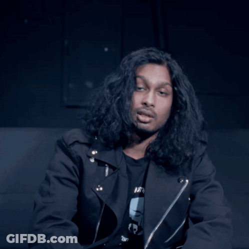 Long Hair Man In Black Jacket Shirt Saying Nothing GIF