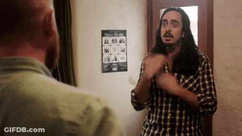 Long-Haired Bearded Man And Small Plants Poster GIF
