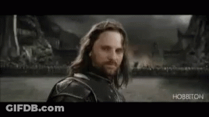 Long Haired Bearded Man At It's Coming Home Sign GIF