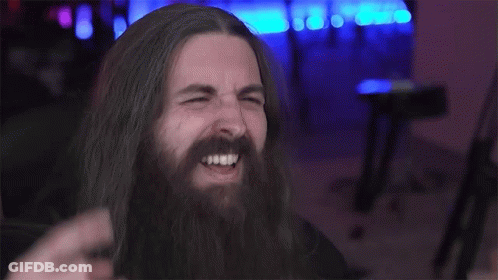 Long Haired Bearded Man Giving Horns GIF
