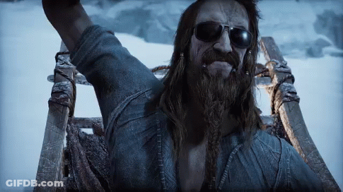 Long Haired Bearded Man In Sunglasses On Sled GIF