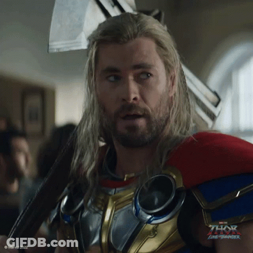 Long Haired Bearded Man In Superhero Costume GIF