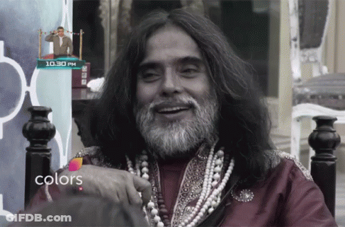 Long Haired Bearded Man Smiling At 10.30 Pm Sign GIF