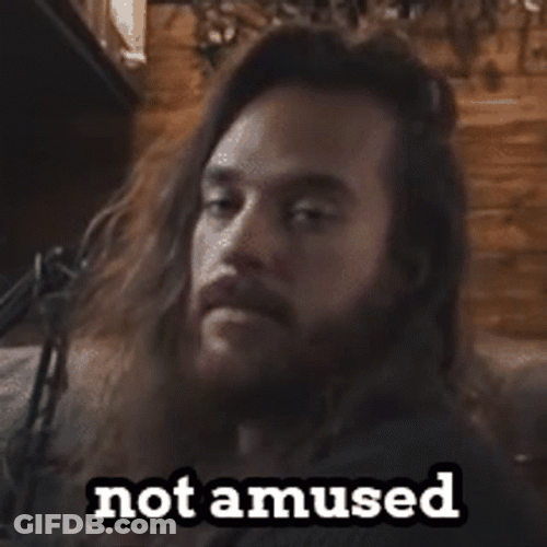Long Haired Guy Not Amused GIF
