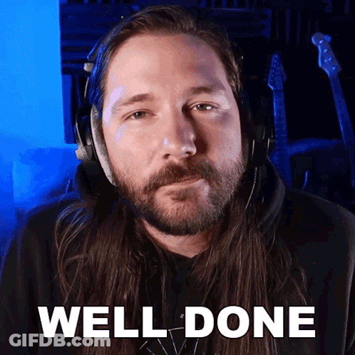 Long Haired Man Headphones Saying Well Done GIF
