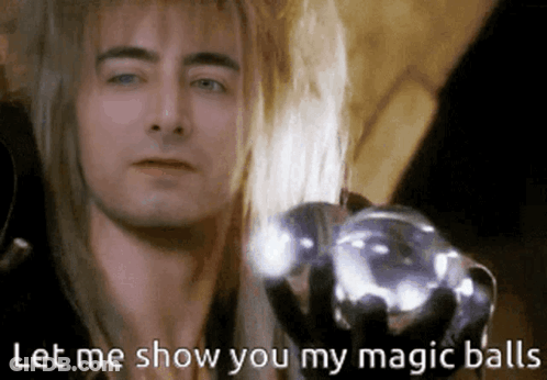 Long-Haired Man Holding Glass Ball Says Magic Balls GIF