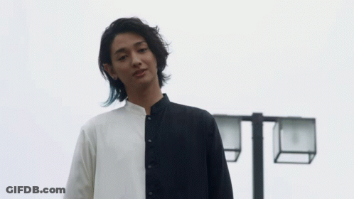 Long-Haired Man In Black And White Shirt GIF