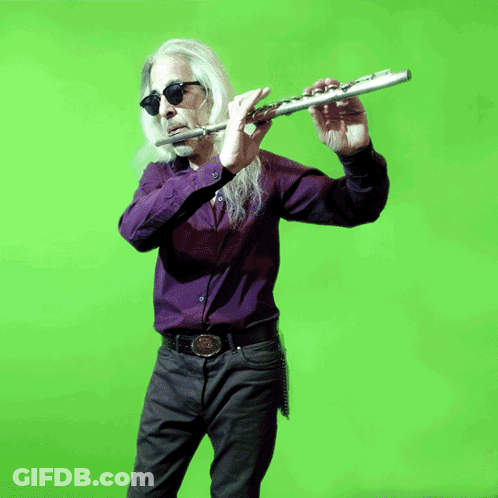 Long-Haired Man In Sunglasses Playing Flute GIF