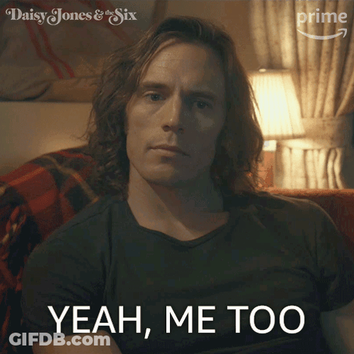 Long-Haired Man Sitting On Couch Saying Yeah Me Too GIF