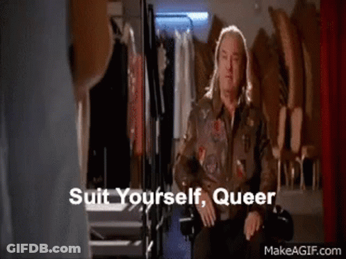 Long-Haired Man Talking To Woman In Dressing Room GIF