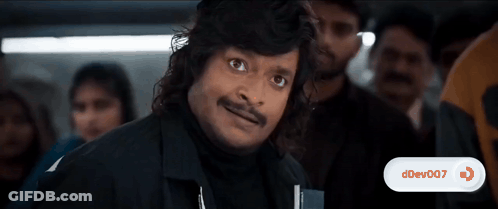 Long-Haired Man With Mustache Making Funny Face GIF