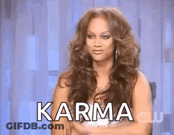 Long Haired Woman Arms Crossed In Chair Karma GIF