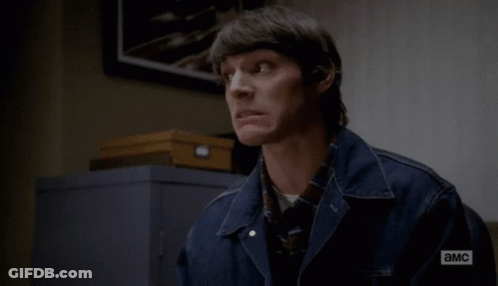 Long Hallway With Men's Faces On Walls GIF