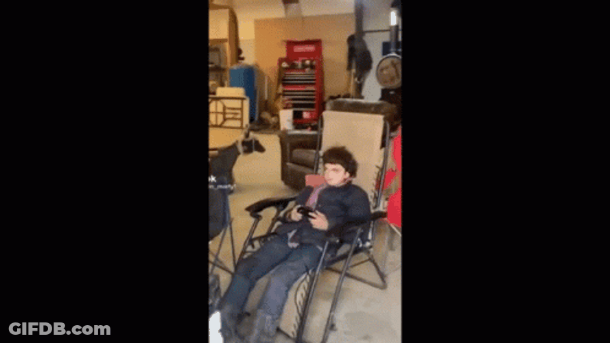 Look At Me Guy Seating While Playing GIF
