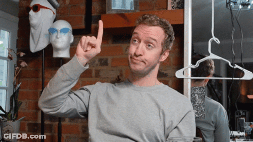 Look Pointing Up Puckered Face GIF