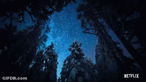 Looking Up At A Starry Night Sky With A Netflix Logo In The Corner GIF