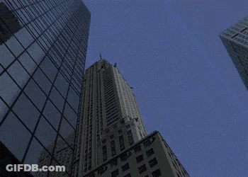Looking Up At A Tall Building With A Sign That Says ' Chicago ' GIF