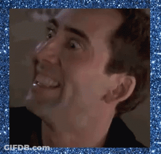 Looney Nic Cage Acting Strange GIF