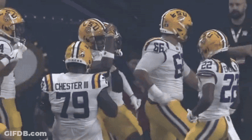 LSU Football Players In A Huddle GIF