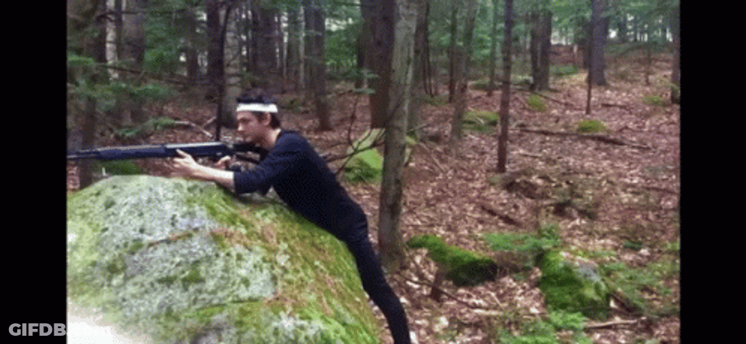 Lt Dan Firing In The Forest GIF